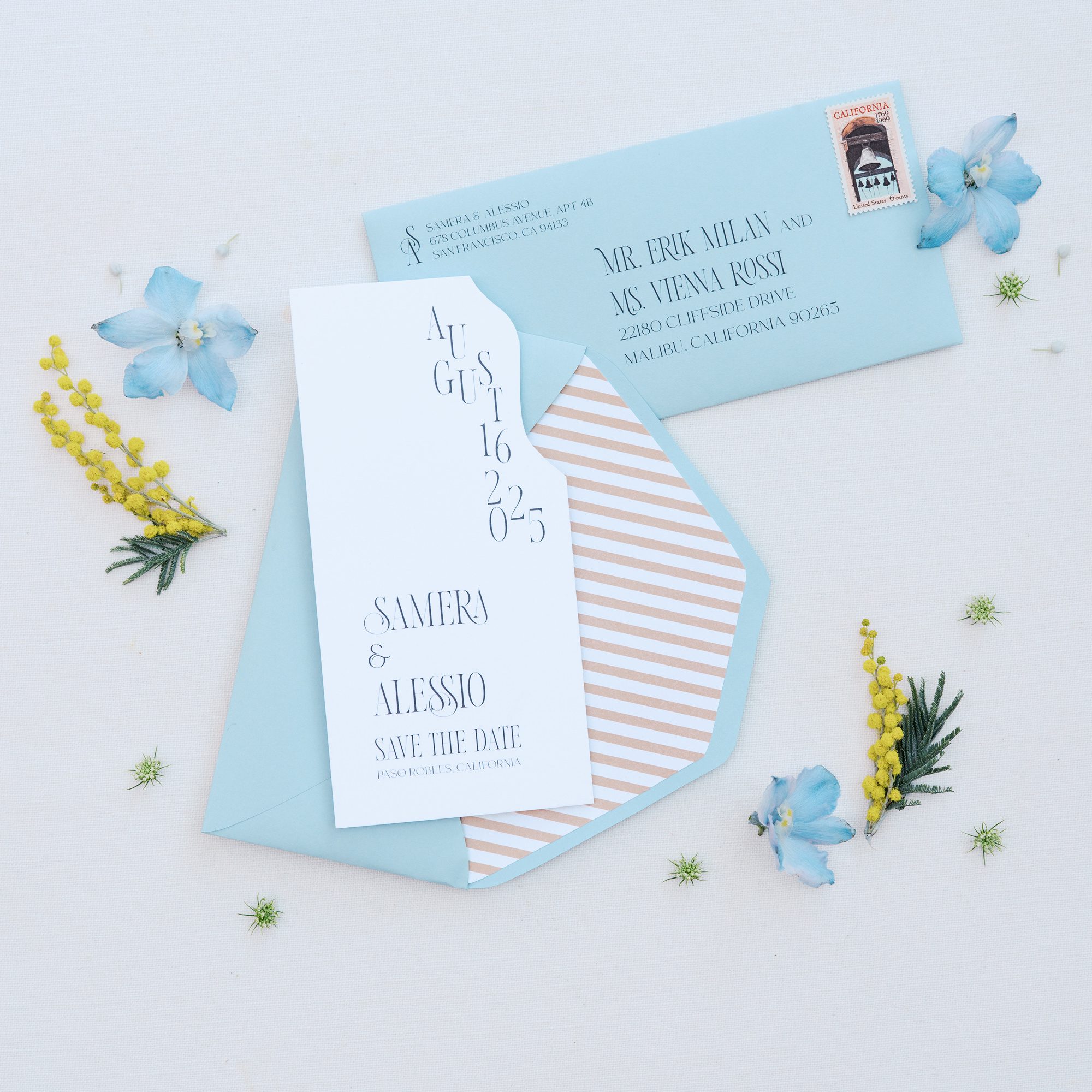 Save the date and invitation cards featuring curved shoreline edges and placid blue palette inspired by the Amalfi Coast.