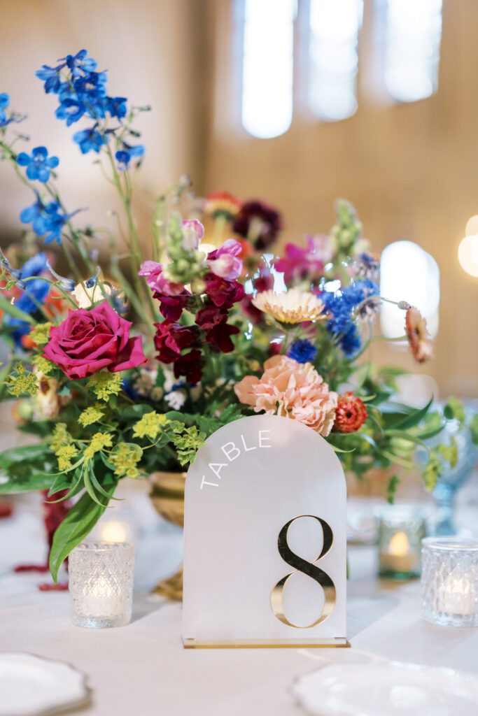 Modern table number sign with arch shape and soft neutral tones