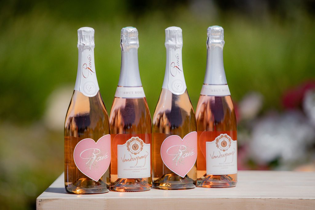 Vanderpump Wines rosé and Rava Wines sparkling bottles displayed at Women in Wine luncheon in Paso Robles