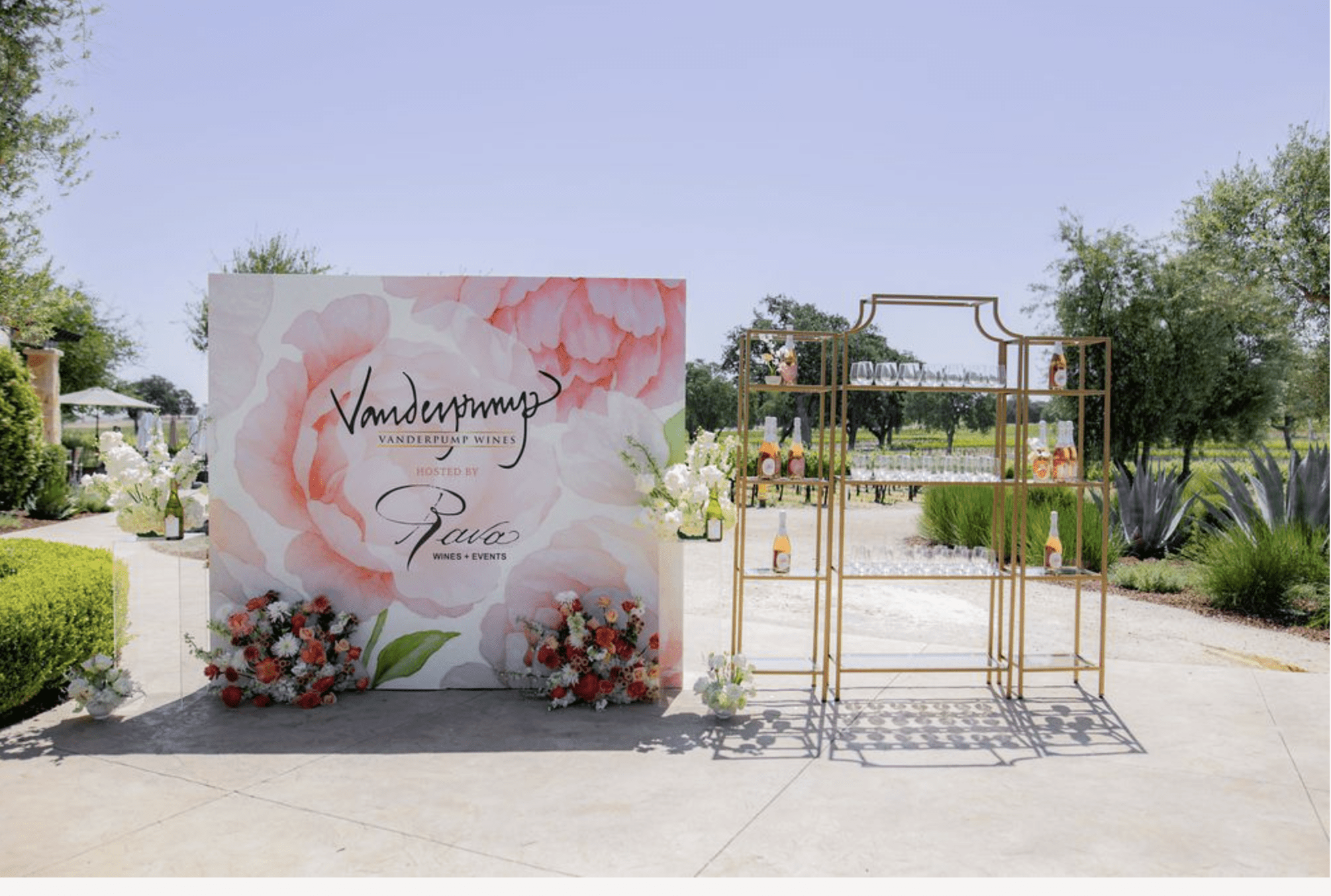 Custom floral backdrop and event signage for Vanderpump Wines at Rava Wines Paso Robles