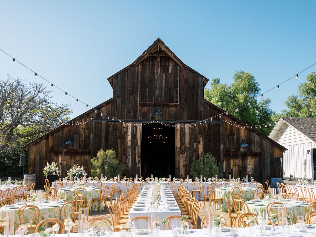 Outdoor wedding reception with Hydrangea Meadow linens at Greengate Ranch & Vineyard